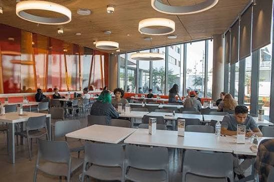 College students at a campus cafeteria counter